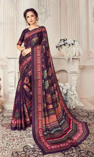 Look Attractive Wearing This Saree In Dark Purple  Color Paired With Dark Purple Colored Blouse. This Saree And Blouse Are Georgette Based Beautified With Prints All Over It.