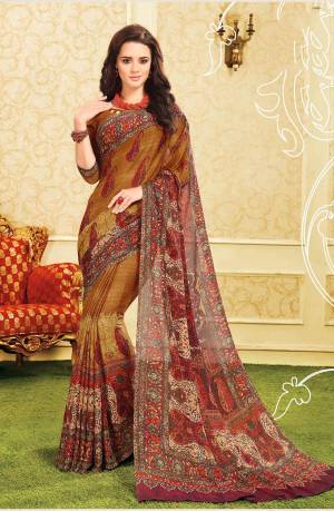 Look Attractive Wearing This Saree In Brown And Multi Color Paired With Brown Colored Blouse. This Saree And Blouse Are Georgette Based Beautified With Prints All Over It.