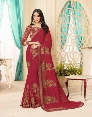 For A Royal Enhanced Look, Grab This Designer Saree In Maroon Color Paired With Maroon Colored Blouse. This Saree Is Fabricated On Georgette Paired With Brocade Fabricated Blouse. Its Rich color Will Give A Royal Look Like Never Before.