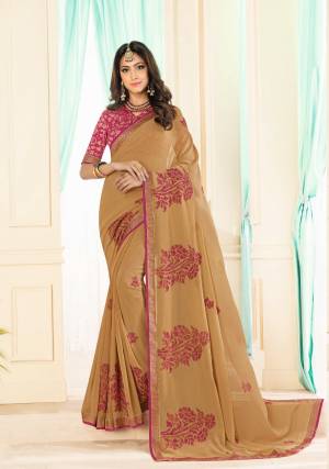 Simple And Elegant Looking Saree Is Here In Beige Color Paired With Dark Pink Colored Blouse. This Saree Is Georgette Based Paired With Brocade Fabricated Blouse. 