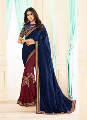 You Will Definitely Earn Lots Of Compliments Wearing This Designer Saree In Navy Blue And Maroon Color Paired With Navy Blue Colored Blouse. This Saree Is Fabricated On Georgette Paired With Brocade Fabricated Blouse. Buy This Saree Now.