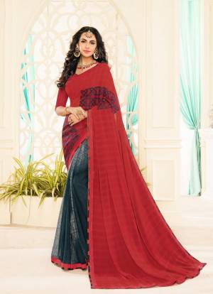 Add This Lovely Designer Saree With Attractive Color Pallete In Red And Grey Colored Saree Paired With Red Colored Blouse. This Saree Is Fabricated On Georgette Paired With Brocade Fabricated Blouse.