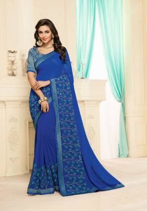 For Your Semi-Casual Wear, Grab This Saree In Blue Color Paired With Blue Colored Blouse. This Saree Is Georgette Based Paired With Brocade Fabricated Blouse. Both Its Fabrics Ensures Superb Comfort All Day Long.