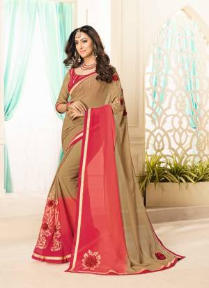 Simple And Elegant Looking Saree Is Here In Beige And Red Color Paired With Red And Beige Colored Blouse. This Saree Is Georgette Based Paired With Brocade Fabricated Blouse. 