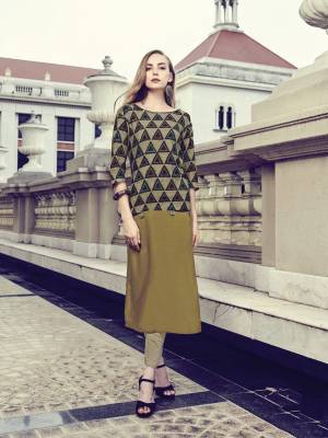 Add This Multi Colored Readymade Kurti To Your Wardrobe, It Is Fabricated On Rayon Beautified With Geometric Prints. It Is Also Available In All Regular Sizes. 