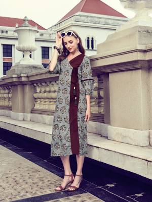 You Will Earn Lots Of Compliments Wearing This Designer Readymade Kurti In Grey And Maroon Color Fabricated On Rayon. This Is Available In All Regular Sizes. Buy Now.