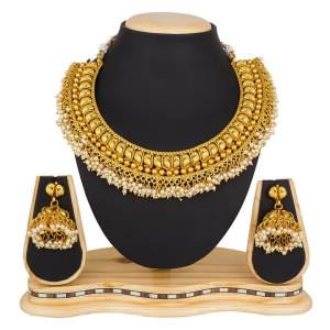 Give A Rich And Elegant Look To Your Neckline Wearing This Elegant Looking Necklace Set In Golden Color. This Necklace Set Be Paired With Any Colored Ethnic Attire. Buy Now.