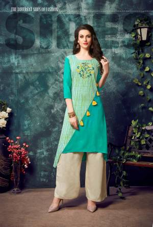 Here Is A Designer Readymade Kurti In Sea Green Color Fabricated On Rayon. This Pretty Kurti Has Asymetric Pattern Which Will Earn You Lots Of Compliments From Onlookers. 