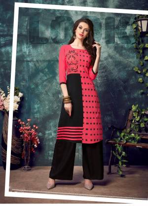 Shine Bright Wearing This Readymade Kurti In Fuschia Pink And Black Color Fabricated On Rayon. It Is Beautified With Thread Work And Also Available In All Regular Sizes. 