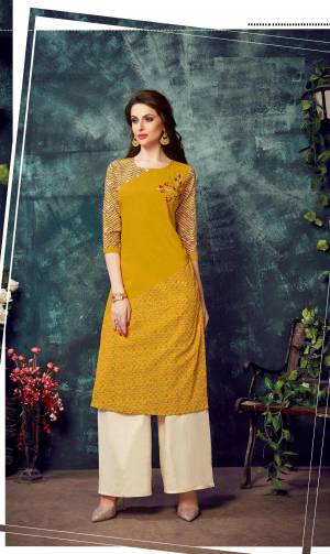 This Festive Season, Have Comfort And Beauty Wearing This Readymade Kurti In Yellow Color Fabricated On Rayon Beautified With Thread Work. Its Fabric Ensures Superb Comfort All Day Long. Buy Now.