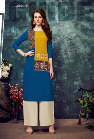 Add This Beautiful Readymade Kurti To Your Wardrobe In Royal Blue Color Fabricated On Rayon. This Kurti Is Beautified With Thread Work And Prints. Buy Now.
