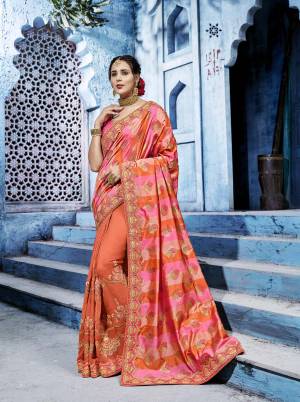Shine Bright Wearing This Designer In Peach And Orange Color Paired With Contrasting Dark Pink Colored Blouse. IT Has Lovely Silk Based Fabric Which IS Easy To Carry And Durable. Buy Now.