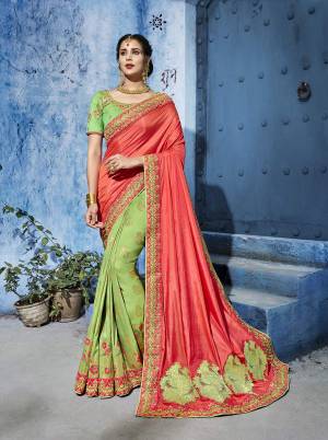 Very Pretty Color Pallete Is Here With This Designer Saree In Orange And Light Green Color Paired With Light Green Colored Blouse. This Saree And Blouse Are Silk Based Beautified With Weave And Embroidery. Buy Now.
