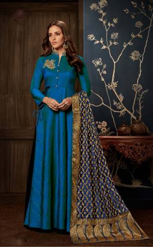 Shine Bright Wearing This Designer REAdymade Gown In Royal Blue Color Paired With Royal Blue Colored Dupatta. Its Top And Bottom Are Silk based Which IS Durable And Easy To Carry Throughout The Gala.