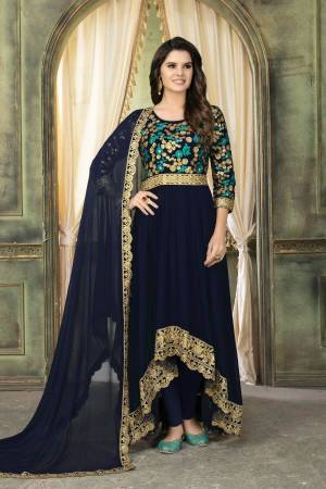 Enhance Your Personality Wearing This Designer Floor Length Suit In Navy Blue Color Paired With Navy Blue Colored Bottom And Dupatta. Its Unique Hight Low Pattern Will Earn You Lots Of Compliments From Onlookers. Also Its Georgette Fabric Ensures Superb Comfort Throughout The Gala.