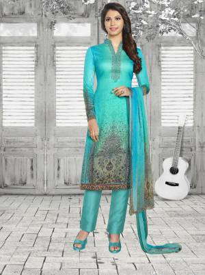 Add This Pretty Shade In Blue With This Designer Semi-Stitched Suit In Turquoise Blue Color Paired With Turquoise Blue Colored Bottom And Dupatta. Its Top IS Soft Cotton Based Paired With Cotton Bottom And Chiffon Dupatta. Buy Now.