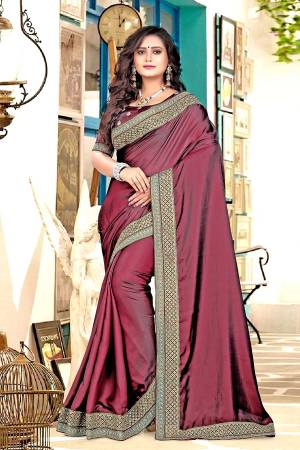 Grab This Beautiful Designer Saree In Wine Color Paired with Wine Colored Blouse. This Saree And Blouse Are Silk Baased Beautified With Heavy Embroidered Lace Border And Blouse. Also Its Silk Fabric Gives A Rich Look To Your Personality. 