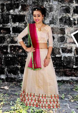 Simple And Elegant Looking Designer Lehenga Choli Is Here In Beige Color Paired With Rani Pink Colored Dupatta. Its Blouse And Lehenga Are Fabricated On Jacquard Silk Paired With Net Fabricated Dupatta. 