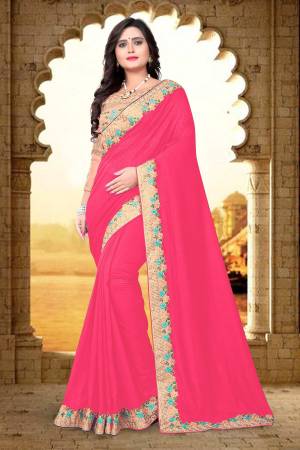 Grab This Beautiful And Attractive Looking Saree In Rani Pink Color Paired With Contrasting Peach Colored Blouse. This Saree Is And Blouse Are Silk Based Beautified With Heavy Embroidery Over The Blouse and Saree Lace Border.
