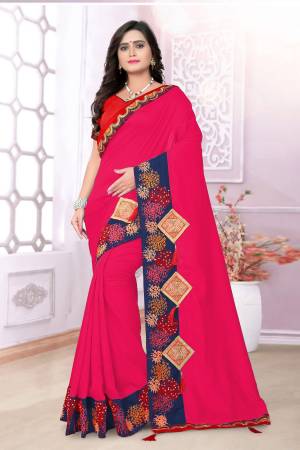 Grab This Beautiful Silk Based Saree In Dark Pink Color Paired With Contrasting Red Colored Blouse. This Saree And Blouse Are Fabricated On Art Silk Beautified With Embroidery And Patch Work. Also The Silk Fabric Gives A Rich Look To Your Personality. Buy Now.