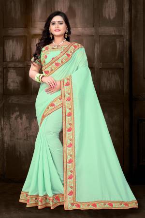 Celebrate This Festive Season With Designer Saree In Bright Color Pallete. This Pretty Saree Is In Light Green Color Paired With Light Green Colored Blouse. This Saree And Blouse Are Silk Based Which Also Gives An Enhanced Look To Your Personality. 