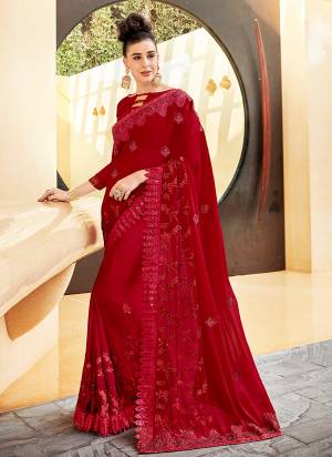 Give A Royal Look To Your Personality Wearing This Designer Saree In Maroon Color Paired With Maroon Colored Blouse. This Saree Is Georgette Based Paired With Art Silk Fabricated Blouse. Buy Now.