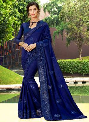 Shine Bright Wearing This Royal Blue Colored Saree Paired With Royal Blue Colored Blouse. This Saree And Blouse Are Silk Based Beautified With Tone To Tone Embroidery. 