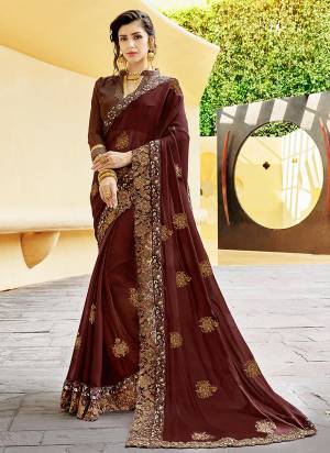 For A Bold And Beautiful Look, Grab This Designer Saree In Brown Color Paired With Brown Colored Blouse. This Is Light In Weight As It Is Chiffon Based Paired With Art Silk Fabricated Blouse. 