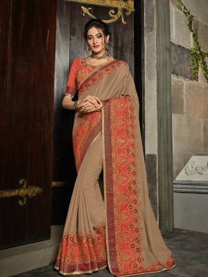 All the Fashionable women will surely like to step out in style wearing this Light brown color bright georgette saree. this gorgeous saree featuring a beautiful mix of designs. look gorgeous at an upcoming any occasion wearing the saree. Its attractive color and designer heavy embroidered design, Flower patch design, zari resham work, stone design, beautiful floral design work over the attire & contrast hemline adds to the look. Comes along with a contrast unstitched blouse.