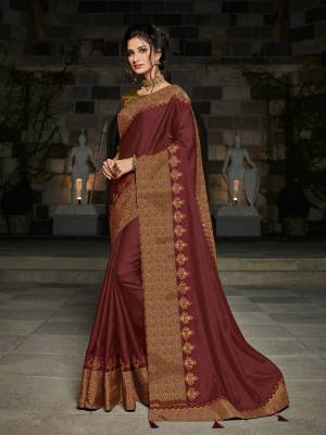 Impress everyone with your amazing Trendy look by draping this maroon color satin silk saree. this party wear saree won't fail to impress everyone around you. this gorgeous saree featuring a beautiful mix of designs. Its attractive color and designer heavy embroidered design, designer blouse, beautiful floral design work over the attire & contrast hemline adds to the look. Comes along with a contrast unstitched blouse.