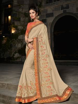Drape this beige color silk fabrics saree. this gorgeous saree featuring a beautiful mix of designs. look gorgeous at an upcoming any occasion wearing the saree. Its attractive color and designer heavy embroidered design, Flower patch design, zari work, stone design, beautiful floral design work over the attire & contrast hemline adds to the look. Comes along with a contrast unstitched blouse.