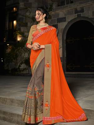 Presenting this orange and Grey color silk fabrics saree. Ideal for party, festive & social gatherings. this gorgeous saree featuring a beautiful mix of designs. Its attractive color and designer heavy embroidered design, Flower patch design, zari resham work, stone design, beautiful floral design work over the attire & contrast hemline adds to the look. Comes along with a contrast unstitched blouse.