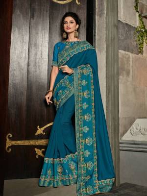 Change your wardrobe and get classier outfits like this gorgeous blue color silk fabrics saree. Ideal for party, festive & social gatherings. this gorgeous saree featuring a beautiful mix of designs. Its attractive color and designer heavy embroidered design, Flower patch design, zari resham work, stone design, beautiful floral design work over the attire & contrast hemline adds to the look. Comes along with a contrast unstitched blouse.