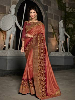 Show your elegance by wearing this gorgeous maroon color glitter imported fabrics saree. Ideal for party, festive & social gatherings. this gorgeous saree featuring a beautiful mix of designs. Its attractive color and designer heavy embroidered design, Flower patch design, zari resham work, stone design, beautiful floral design work over the attire & contrast hemline adds to the look. Comes along with a contrast unstitched blouse.