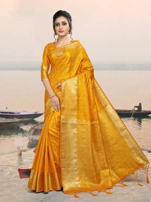 This Festive Season, Adorn A Rich And Elegant Looking Silk Based Saree In Musturd Yellow Color Paired With Musturd Yellow Colored Blouse. Its Fabric And Color Will Earn You Lots Of Compliments From Onlookers. 