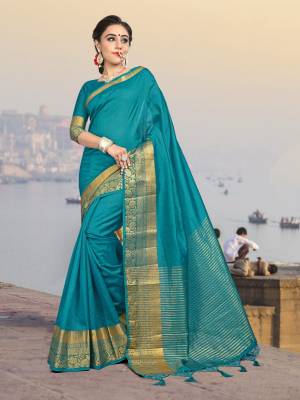 This Festive Season, Adorn A Rich And Elegant Looking Silk Based Saree In Blue Color Paired With Blue Colored Blouse. Its Fabric And Color Will Earn You Lots Of Compliments From Onlookers. 