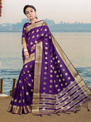 This Festive Season, Adorn A Rich And Elegant Looking Silk Based Saree In Purple Color Paired With Purple Colored Blouse. Its Fabric And Color Will Earn You Lots Of Compliments From Onlookers. 