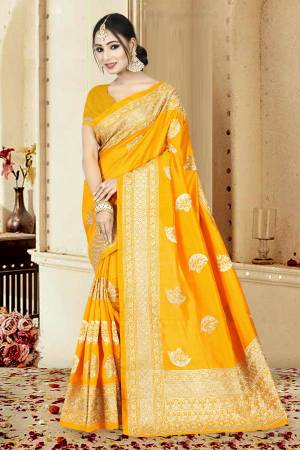 Celebrate This Festive With This Attractive Looking Silk Based Saree In Musturd Yellow Color Paired With Musturd Yellow Colored Blouse. This Saree And Blouse Are Fabricated On Art Silk. 