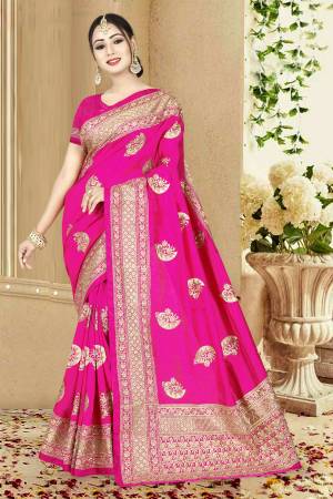 Shine Bright Wearing This Designer Rani Pink Colored Saree Paired With Rani Pink Colored Blouse. This Saree And Blouse Are Fabricated On Art Silk Beautified With Jari Embroidery And Stone Work.