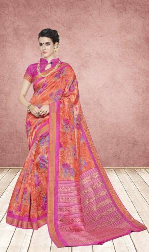 Shine Bright Wearing This Saree In Orange Color Paired With Pink Colored Blouse. This Saree And Blouse Are Fabricated On Cotton Silk Beautified With Floral Prints. This Saree Is Light Weight And Easy To Carry All Day Long.
