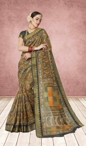 All Color Is The Best Color To Wear So Grab This Saree In Multi Color Paired With Grey Colored Blouse. This Saree And blouse Are Fabricated On Cotton Silk Beautified With Prints All Over The Saree. 