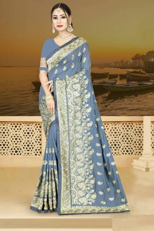Flaunt Your Rich And Elegant Taste Wearing This Designer Saree In Grey Color Paired With Grey Colored Blouse. This Saree IS Fabricated On Silk Georgette Paired With Art Silk Fabricated Blouse.Buy This Saree Now.
