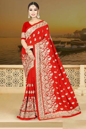 Adorn Thr Pretty angelic Look Wearing This Designer Saree In Red Color Paired With Red Colored Blouse. This Saree Is Fabricated On Silk Georgette Paired With Art Silk Fabricated Blouse. It Has Attractive Jari Embroidery All Over.