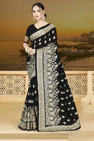 Enhance Your Personality Wearing This Designer Saree In Black Color Paired With Black Colored Blouse. This Saree Is silk Georgette Based Paired With Art Silk Fabricated Blouse. Buy Now.