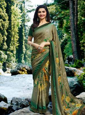 New Shade In Green Is Here With This Designer Saree In Mint Green Color Paired With Dark Green Colored Blouse. This Saree Is Georgette Based Paired With Art Silk Fabricated Blouse. Get This Lovely Shade Now.