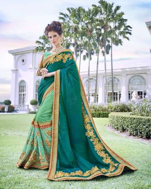 Drape This Saree And Look Pretty Like Never Before. This Beautiful Saree Features A  Embroidered Pattern, Which Makes It A Smart Pick For Party Occasions. Made From Satin Silk And Georgette With Light Green And Beige Colored Blouse Is Made Of Bnglori Silk. Buy It Now.