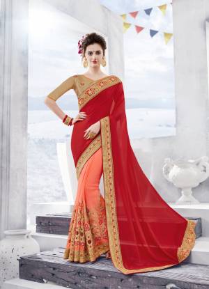 Pretty Shades Are Here With This Designer Saree In Red And Peach Color Paired With Golden Colored Blouse. This Saree Is Chiffon Based Paired With Art Silk Fabricated Blouse. It Is Beautified With Heavy Jari And Thread Work .