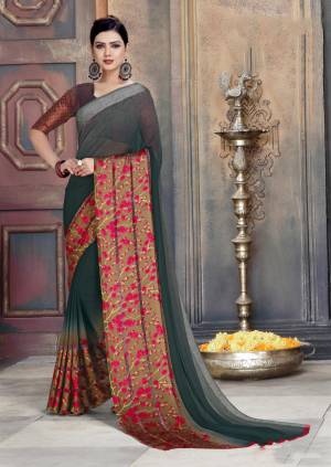 Enhance Your Personality wEaring This Georgette Based Saree In Dark Grey Color Paired With Dark Grey Colored Blouse. It IS Beautified With Satin Patta And Floral Prints. Buy Now.
