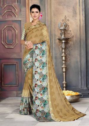 For A Simple And Elegant Look, Grab This Pretty Saree In Beige And Grey Color Paired With Beige And Grey Colored Blouse. This Saree And Blouse Are Georgette Based Beautified With Prints And Satin Patta Border. 