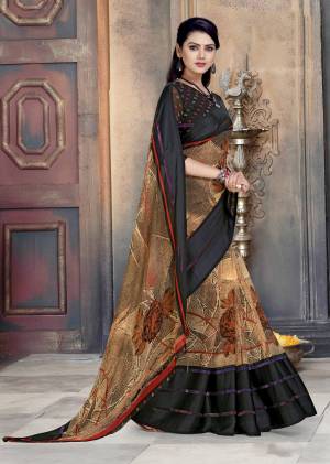 New And Unique Color Pallete Is Here With This Saree In Brown Color Paired With Black Colored Blouse. This Saree Is Fabricated On Georgette Paired With Satin Gergette Blouse. Both The Fabrics Are Light Weight And eAsy To Carry All Day Long.